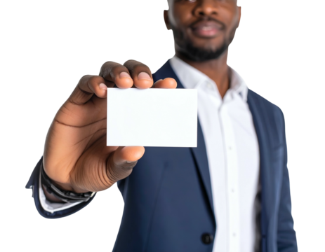 A Black man in a suit holds a blank white business card towards the viewer