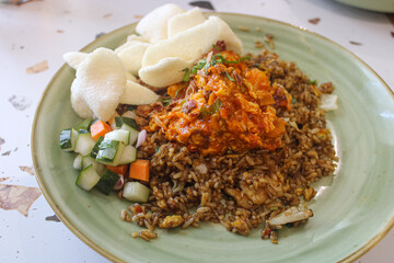 Spicy Indonesian Fried Rice with Chili Egg and Crackers