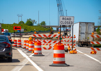 Signs show a Road is closed on a  highway during a large construction zone in Michigan USA 