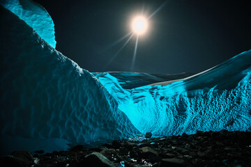 The Blue Glow Inside a Hidden Ice Cave. Antarctica. Queen mount land. Schirmacher Oasis © Ilya