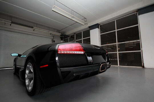 Ciudad de Mexico, Mexico - October 6. 2013: A Lamborghini Gallardo in black color inside the garage