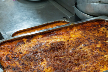 Classic Italian lasagne al forno baked to perfection with layers of cheese and meat sauce