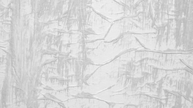 white crumpled and creased glued wrinkled paper poster texture background stop motion