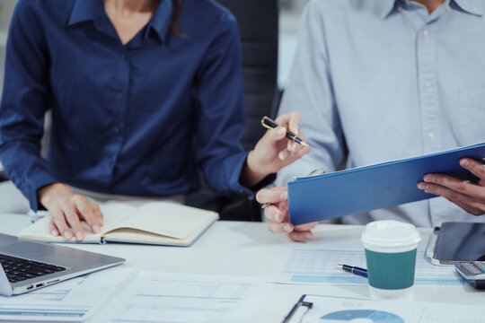 Group Asian professionals in business casual attire engaged in modern education,combining edutainment with skill upskilling,blockchain innovation,decentralized finance learning in office environment.