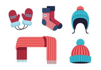 Winter gear gloves socks scarf  two pompom hats arranged on a white background