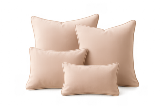 Beige throw pillows set including various shapes and sizes