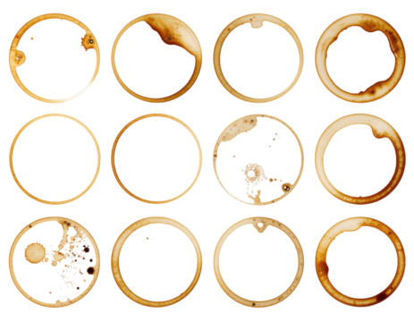 A collection of circular stains, showcasing various patterns and textures, likely created by coffee or similar liquid.