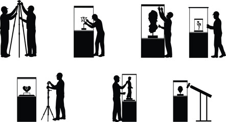 Museum workers installing artwork and sculptures in glass display cases, professional exhibition setup, artifact handling and gallery preparation with careful positioning