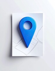 Blue map marker atop a street grid on a white card