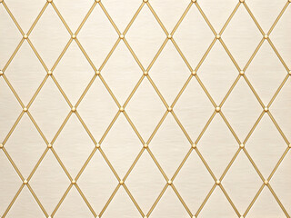 Obraz premium Luxurious seamless diamond quilted pattern background featuring cream fabric and golden studs