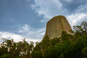 The Devil's Tower in Eastern Wyoming with storm clouds passing by taken on July 5, 2021