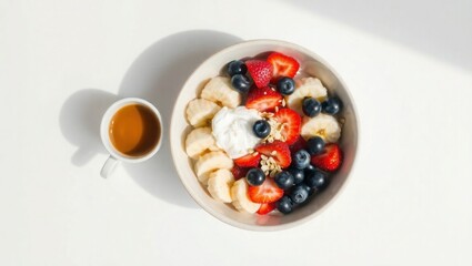 Vibrant fruit bowl with coffee perfect for healthy breakfast inspiration