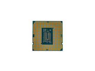 Gold contacts and components on the back of a PC processor. Isolated on white background.