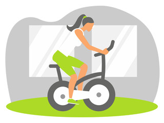 Woman exercising on stationary bike.
