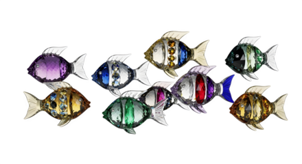 Collection of colorful crystal fish figurines arranged