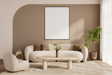 Modern living room interior with blank poster frame mockup above curved beige sofa, green plant, and coffee table in natural sunlight