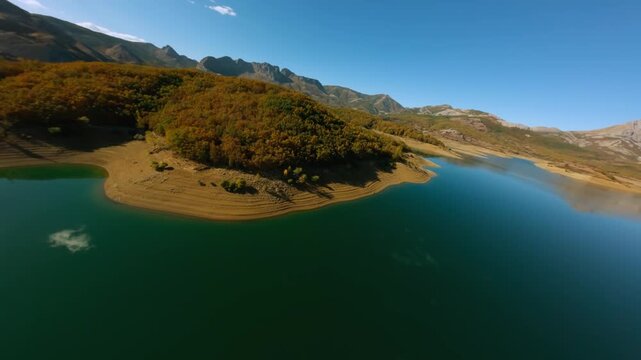 Aerial view of reservoir in Le&oacute;n Spain with autumn colors