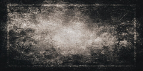 Textured black grunge wall design with cracked distressed surface old industrial tone abstract rough background.