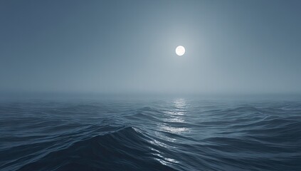 Full moon shines on rippling ocean waves under a hazy sky.