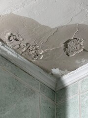 Water dripping from the ceiling. Water from the upper floor.