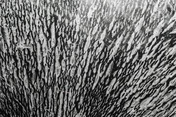abstract pattern on black glass surface