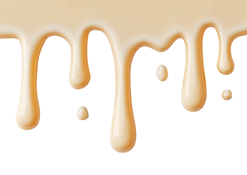 Beige liquid drips down, glossy, smooth and appetizing