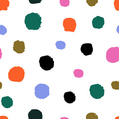 Colorful polka dot seamless pattern with irregular hand drawn dots on white background, flat vector illustration