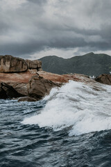 waves crashing on rocks
