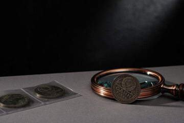 Numismatics. Old collectible coins on the table.