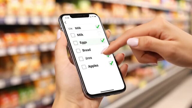 Smartphone Technology Enhances Grocery Shopping Experience Check Off Food Items on Your List at Supermarket for Efficient Consumer Shopping