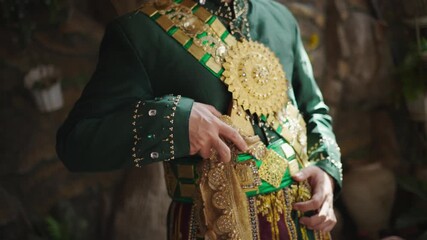 Close-up of Traditional Bugis or Makassar Wedding Attire with Gold Ornaments