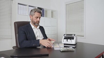 Business concept with cash and digital work. Banker in office. Banking operation in office with laptop and dollars. Finance management concept with money. Businessman accountant in office. - Powered by Adobe