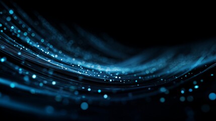 Stunning blue light streaks flowing across a dark background, perfect for technology and innovation concepts and modern backdrops