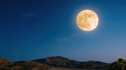 Fototapeta premium Bright full moon rising over distant hills creates serene and cinematic atmosphere