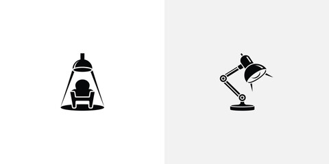 Black and White Design Featuring an Armchair Under a Spotlight and a Desk Lamp