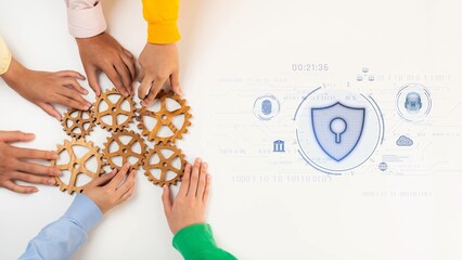 Diverse hands arrange gears symbolizing collaboration in cybersecurity. A digital shield and timer overlay emphasizes urgency and protection in technology-driven environments. Raster