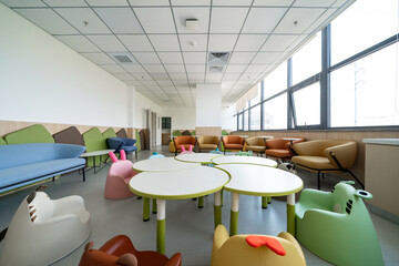 colorful kids' room with playful furniture, large windows, and bright decor