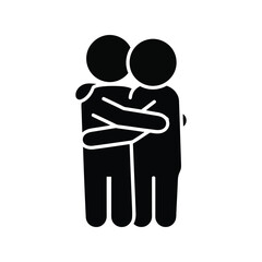 Two silhouetted people hugging embracing close together showing support and friendship unity