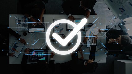 A top-down view of a business meeting in a modern office, showcasing teamwork and technology,...