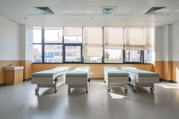 hospital examination room with a bed, desk