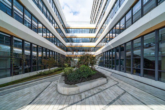 modern building with glass curtain walls and unique architectural design