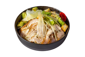 A delicious chicken salad bowl with avocado, croutons and tomato. A healthy, fresh, and appetizing meal is ready to be eaten.
