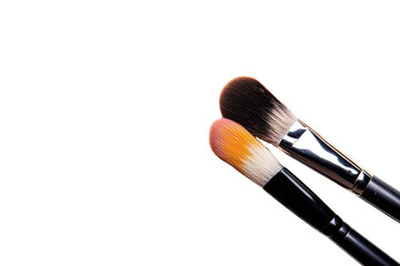 Makeup brushes with colorful eyeshadow isolated on transparent background. Make up base isolated on white background.