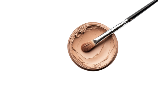 Makeup brush with foundation in a compact isolated on transparent background. Makeup base isolated on white background.