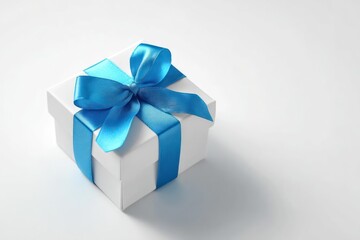 Obraz premium Elegant white gift box tied with a vibrant blue satin ribbon and bow on a clean white background