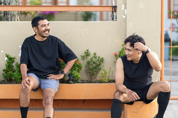 Asian Indonesian Men Resting After Outdoor Running Exercise
