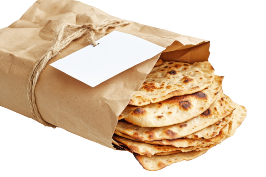 Freshly baked flatbread in a paper bag with a blank tag isolated on transparent background. Brown paper bag with blank label and slices of flatbread isolated on white background.