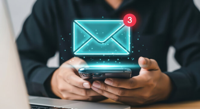 Man Holding Smartphone with Neon Email Icon and New Message Notification