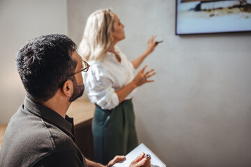 Architectural training in progress with educators presenting ideas to participants