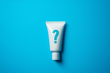 Colorful toothpaste tube on a blue background